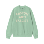 Custom Anti-Fascist Sweatshirt featuring bold, off-white text on a green, long-sleeved crewneck, perfect for expressing anti-
