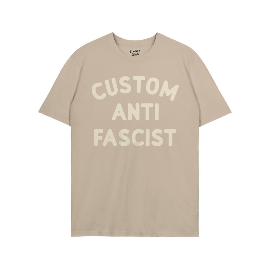 Light tan Custom Anti-Fascist T-shirt with bold off-white block lettering, allowing personalization of the Custom text; perfe
