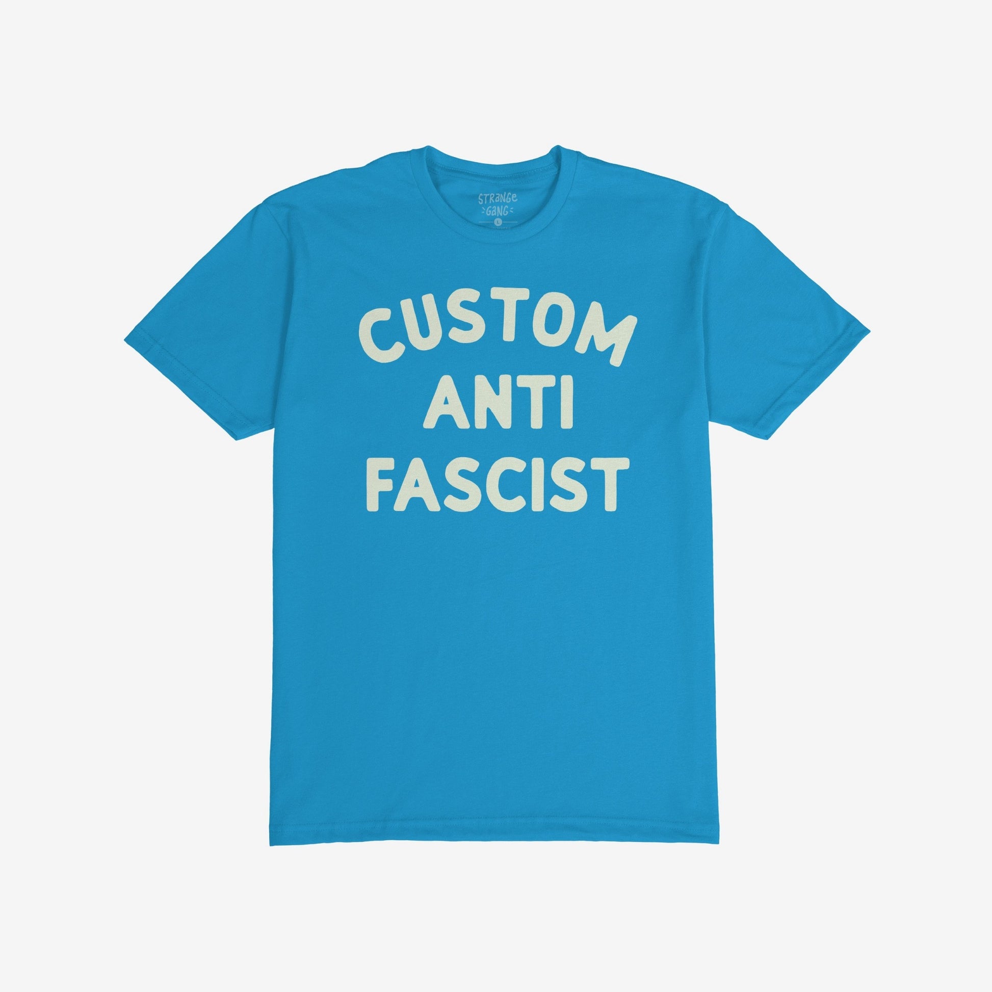 Custom Anti-Fascist T-shirt featuring bold, off-white CUSTOM ANTI FASCIST text on the front. Ideal for expressing activism and personalizing with meaningful words, aligning with the store's advocacy for equality and anti-fascism.