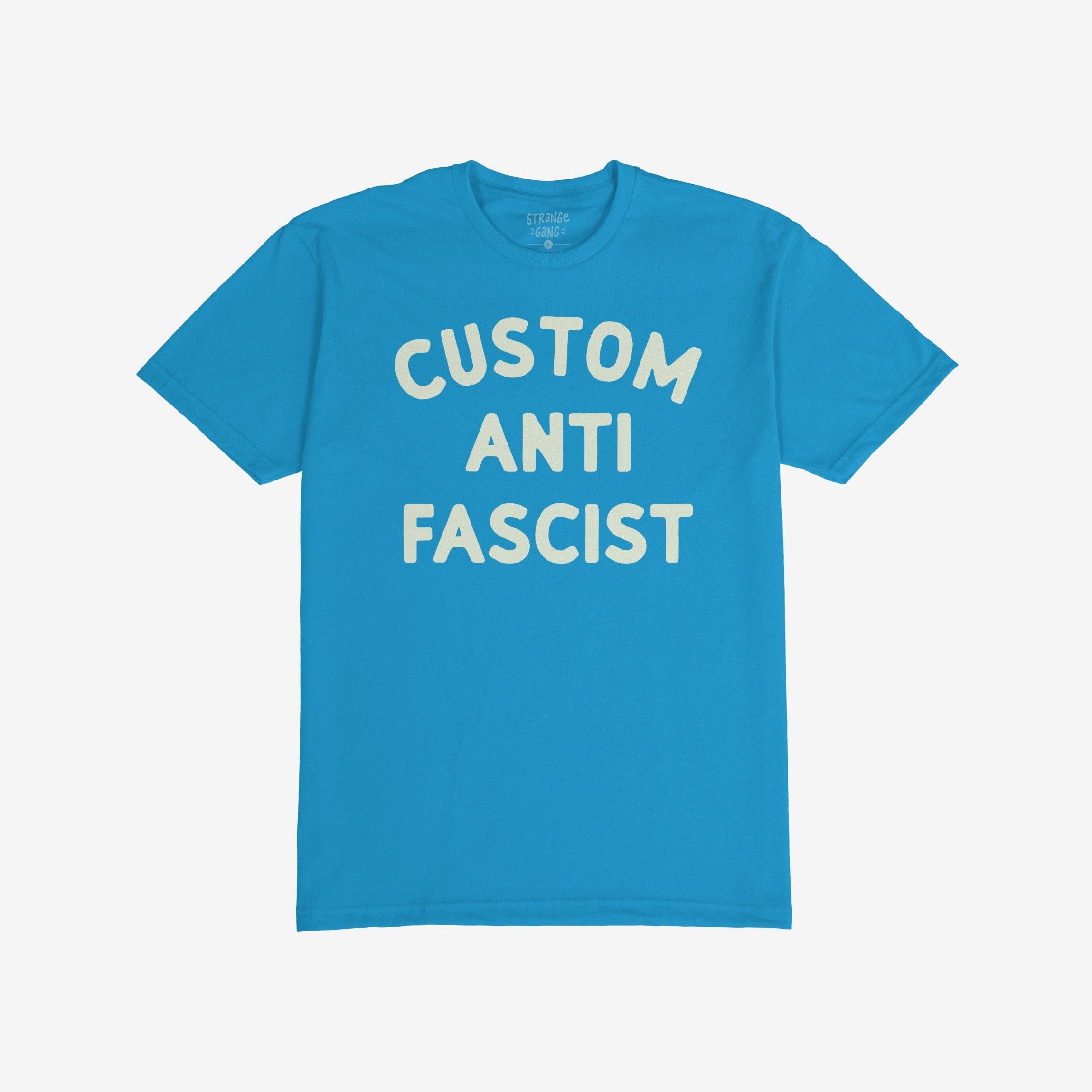 Custom Anti-Fascist T-shirt featuring bold, off-white CUSTOM ANTI FASCIST text on the front. Ideal for expressing activism and personalizing with meaningful words, aligning with the store's advocacy for equality and anti-fascism.