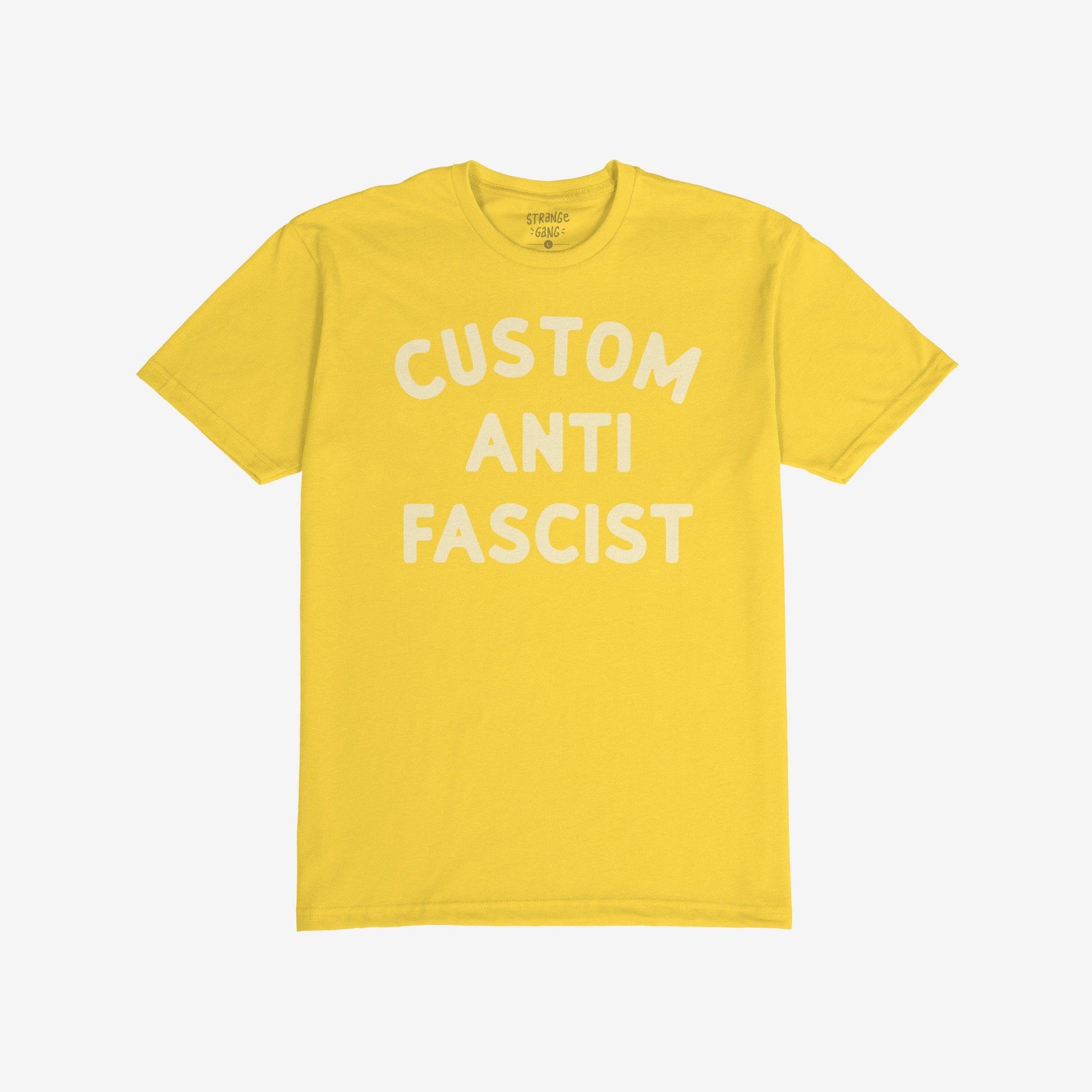 Custom Anti-Fascist T-shirt with bold white letters on the chest, laid flat showing the words CUSTOM ANTI FASCIST, highlighting activism through customizable text for personal expression against fascism.