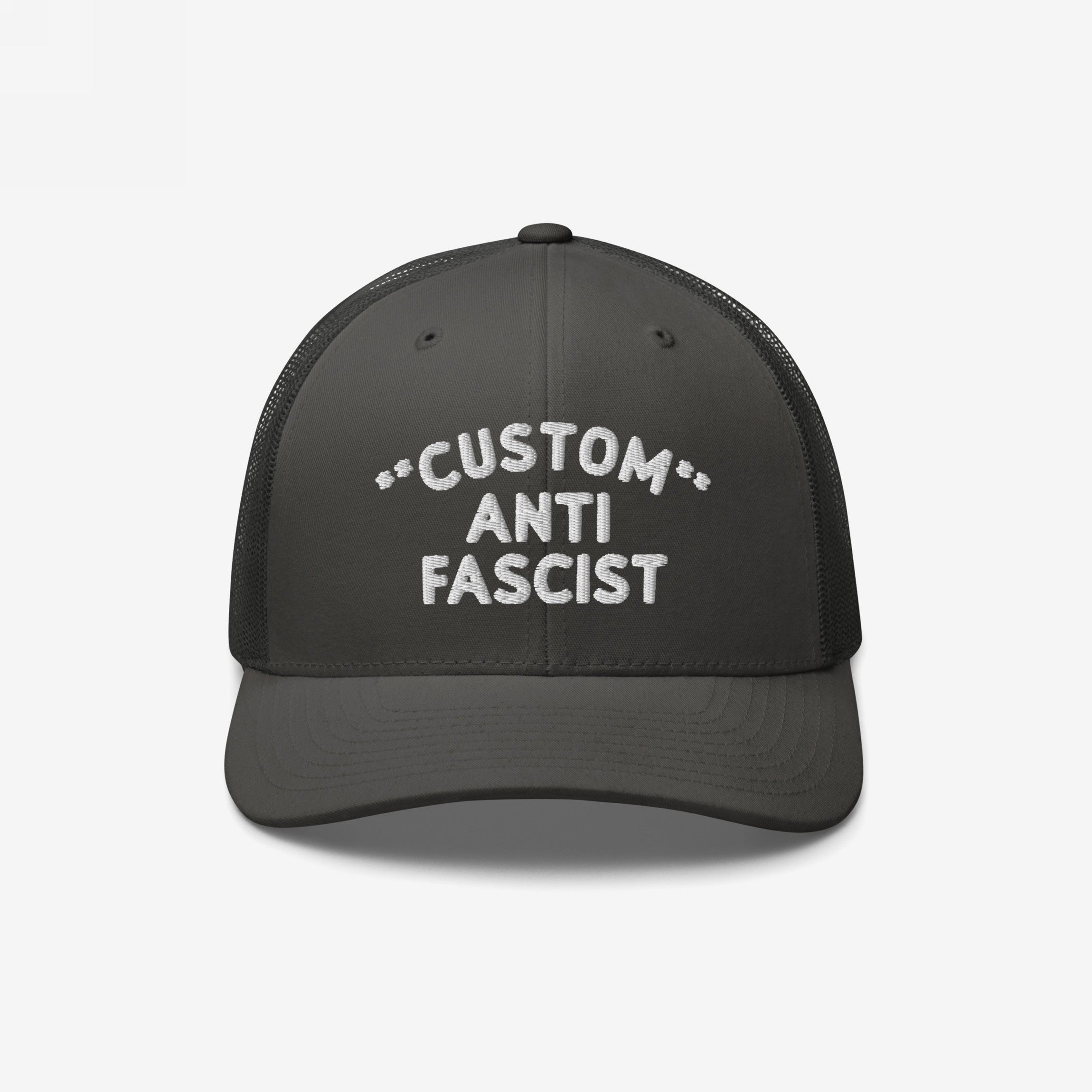 Custom Anti-Fascist Trucker Hat with bold white embroidery on a black base, featuring breathable mesh back and adjustable snap closure, embodying a strong anti-fascist message.