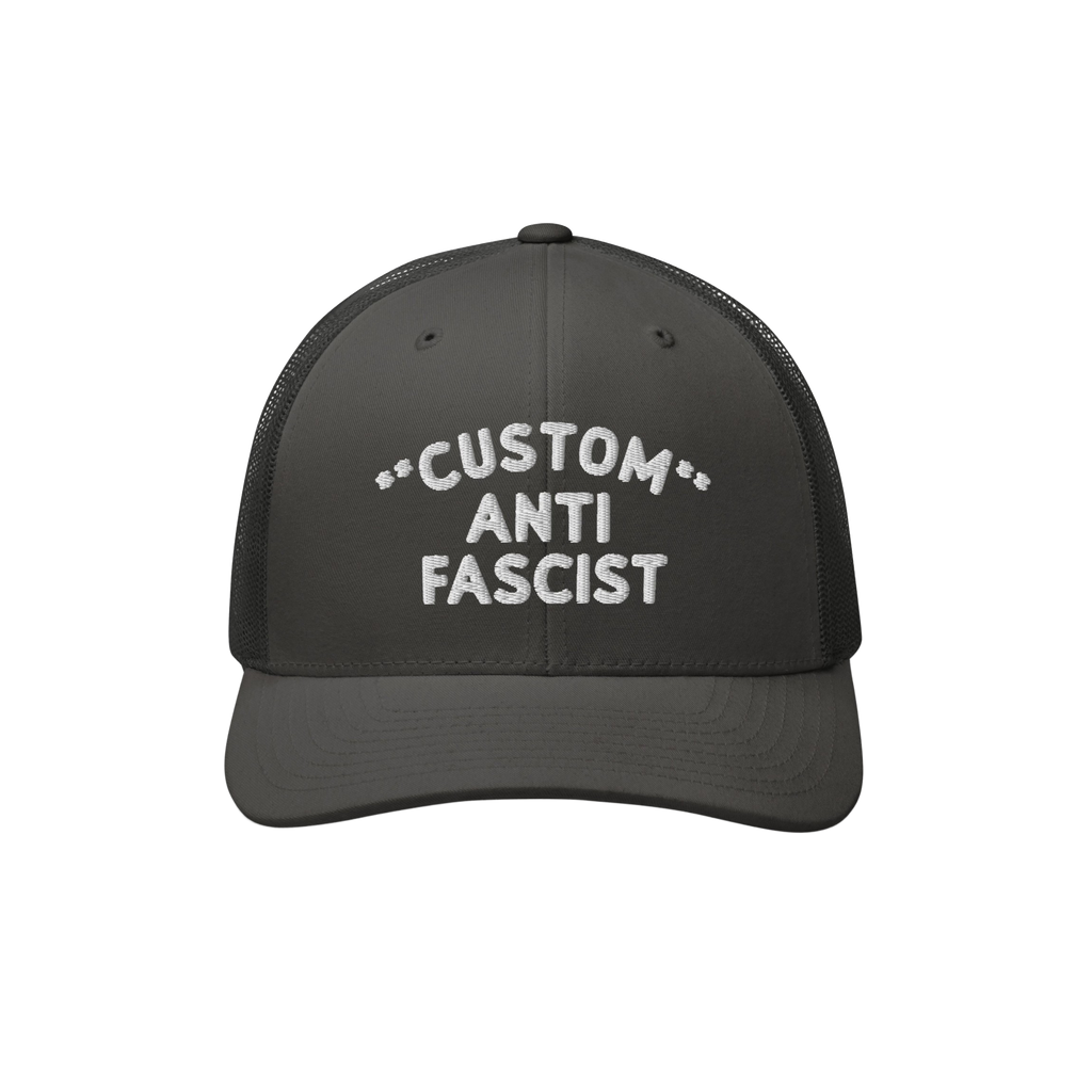 Custom Anti-Fascist Trucker Hat with bold white embroidery on a black base, featuring breathable mesh back and adjustable sna