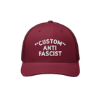 Burgundy mesh-back trucker hat with CUSTOM ANTI FASCIST white embroidery on the front. Features breathable mesh, adjustable s