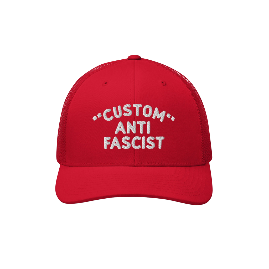 Red Custom Anti-Fascist Trucker Hat with white CUSTOM ANTI FASCIST embroidery on the front, featuring a breathable mesh back 