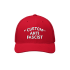 Red Custom Anti-Fascist Trucker Hat with white CUSTOM ANTI FASCIST embroidery on the front, featuring a breathable mesh back 