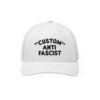 Custom Anti-Fascist Trucker Hat with bold black embroidery on a white front panel, featuring a breathable mesh back and adjus