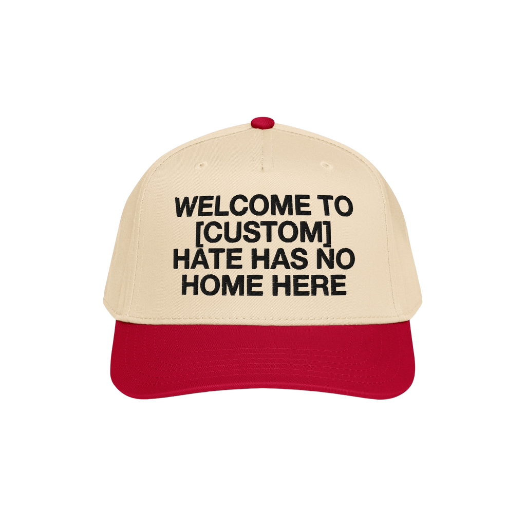 Custom Hate Has No Home Here 5-Panel Hat featuring a beige crown and red brim, with bold black lettering promoting unity and 