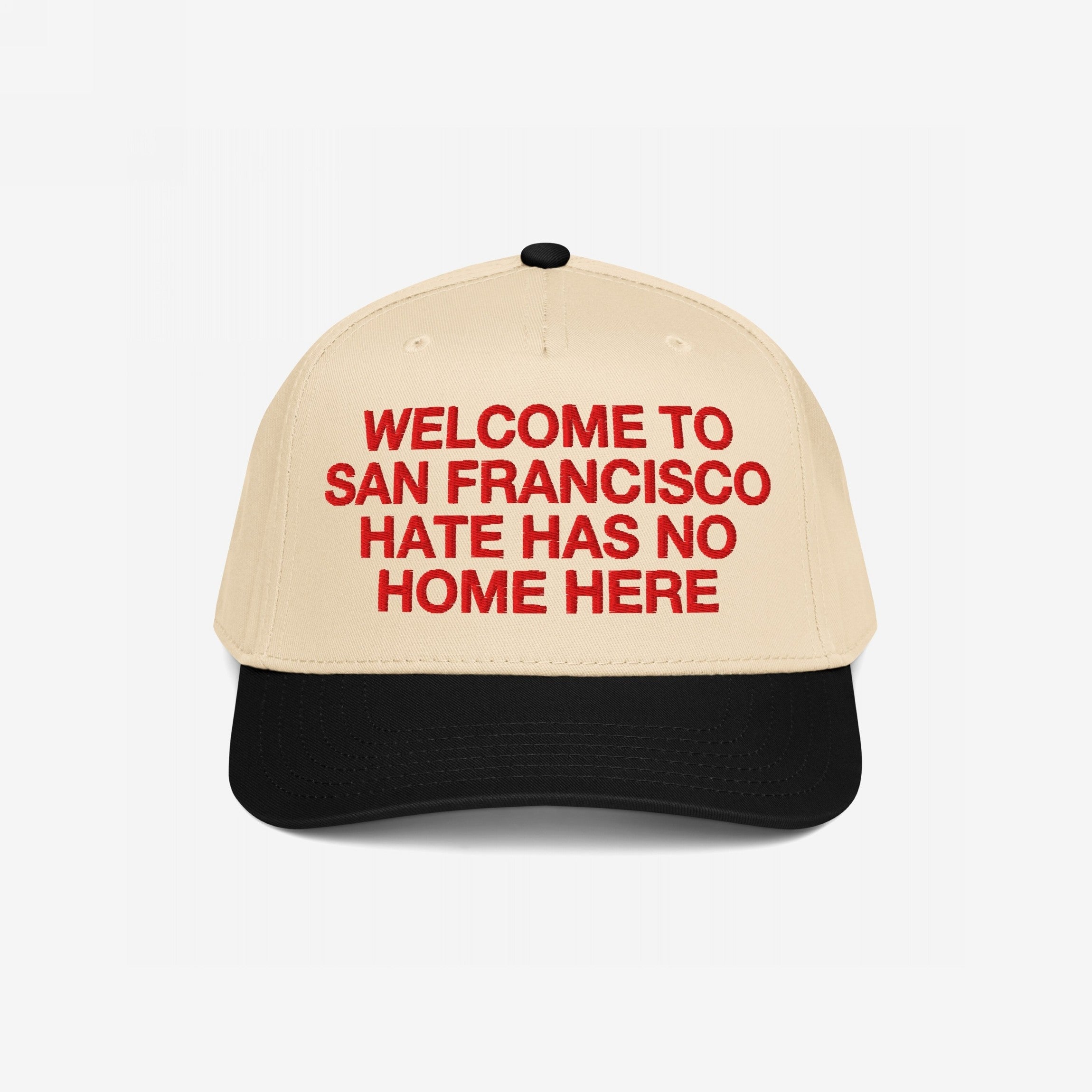 Custom Hate Has No Home Here 5-Panel Hat featuring a beige crown with bold red embroidery reading WELCOME TO SAN FRANCISCO HATE HAS NO HOME HERE and a black visor, embodying unity and inclusivity.