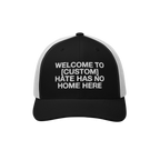 Custom Hate Has No Home Here Trucker Hat with a black front and white mesh back, featuring an embroidered message promoting c