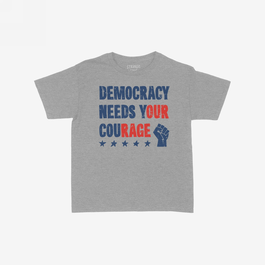 Democracy Women's Baby Tee features Democracy Needs Your Courage in distressed red and blue with a blue stars and fist graphic, embodying a bold, political statement. Perfect for activists and equality supporters.