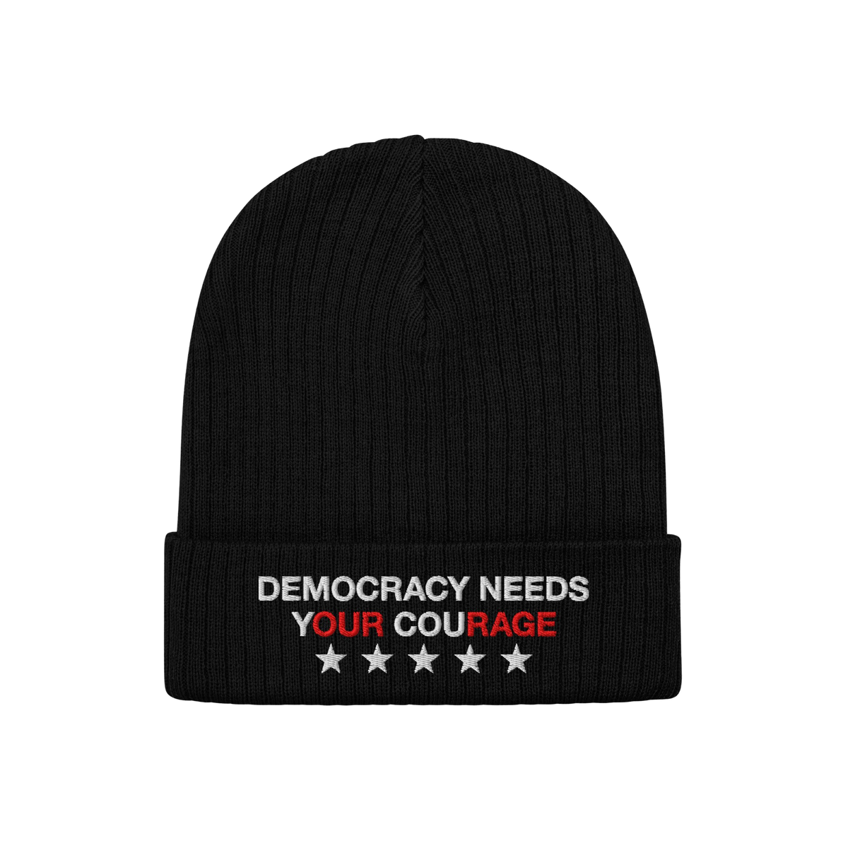 The Democracy Hat is a black knit beanie with a folded cuff, featuring the embroidered slogan DEMOCRACY NEEDS YOUR COURAGE in