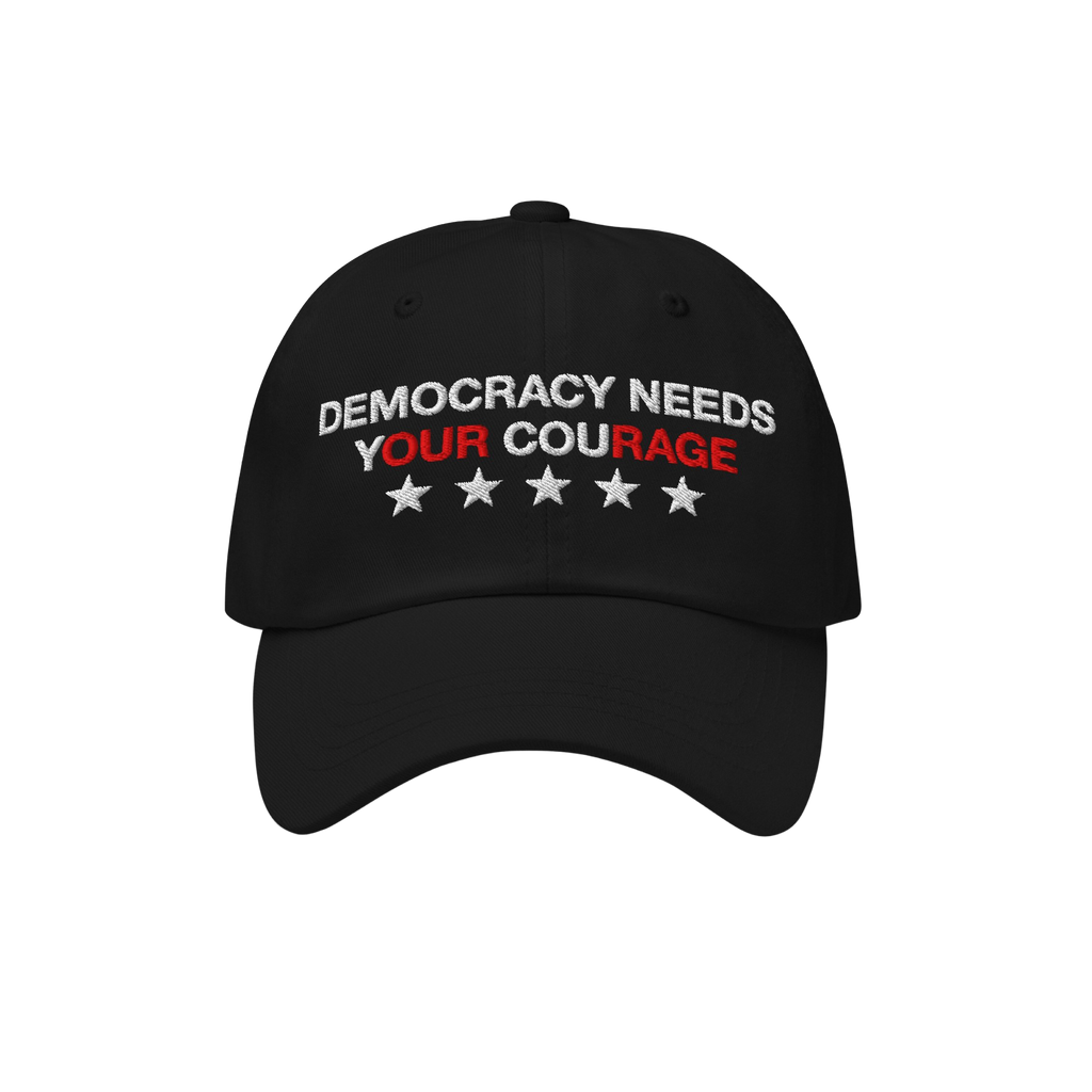 Democracy Hat featuring DEMOCRACY NEEDS YOUR COURAGE embroidered in white and red on a black six-panel cap, with five white s