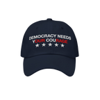 Navy blue Democracy Hat with “DEMOCRACY NEEDS YOUR COURAGE” embroidered on the front, highlighting YOUR COURAGE in red, c