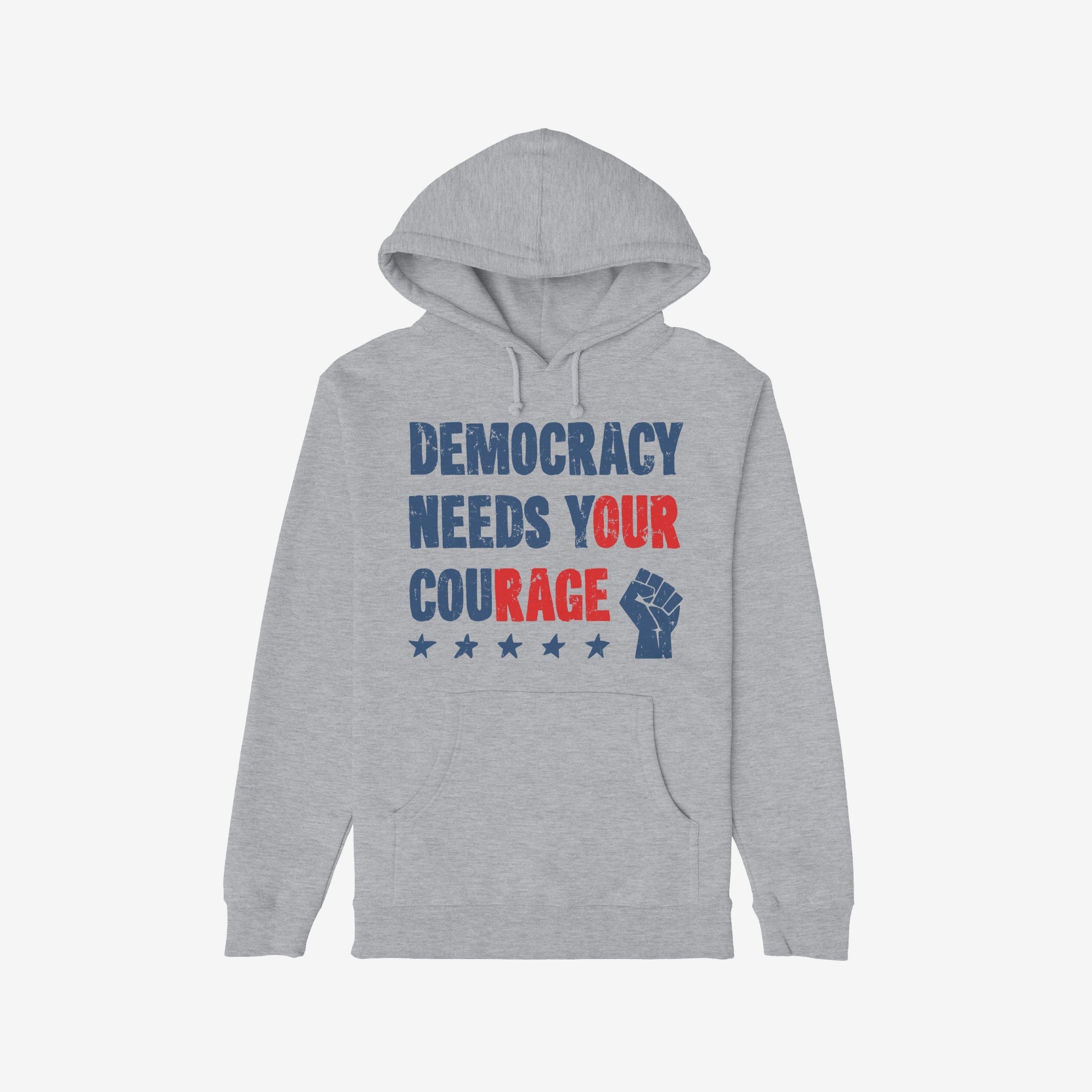 Democracy Shirt: Light-gray hoodie with stencil-style DEMOCRACY NEEDS YOUR COURAGE graphic, featuring distressed stars and raised-fist icon, symbolizing protest energy and resilience. Available in various styles.