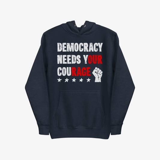 Democracy Hoodie & Sweatshirt featuring “DEMOCRACY NEEDS YOUR COURAGE” in distressed letters with a raised-fist icon and stars, embodying resistance and solidarity for protest and defiance.