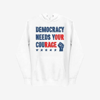 Democracy Hoodie & Sweatshirt featuring a bold, stencil-style slogan “DEMOCRACY NEEDS YOUR COURAGE” with a raised fist and stars, symbolizing defiance and protest.