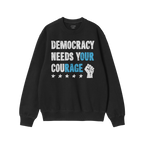 Black long-sleeve crewneck sweatshirt titled Democracy Shirt featuring bold distressed slogan Democracy Needs Your Courage, h