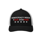 Democracy Hat with the slogan DEMOCRACY NEEDS YOUR COURAGE embroidered on the front, featuring emphasized red lettering YOUR 