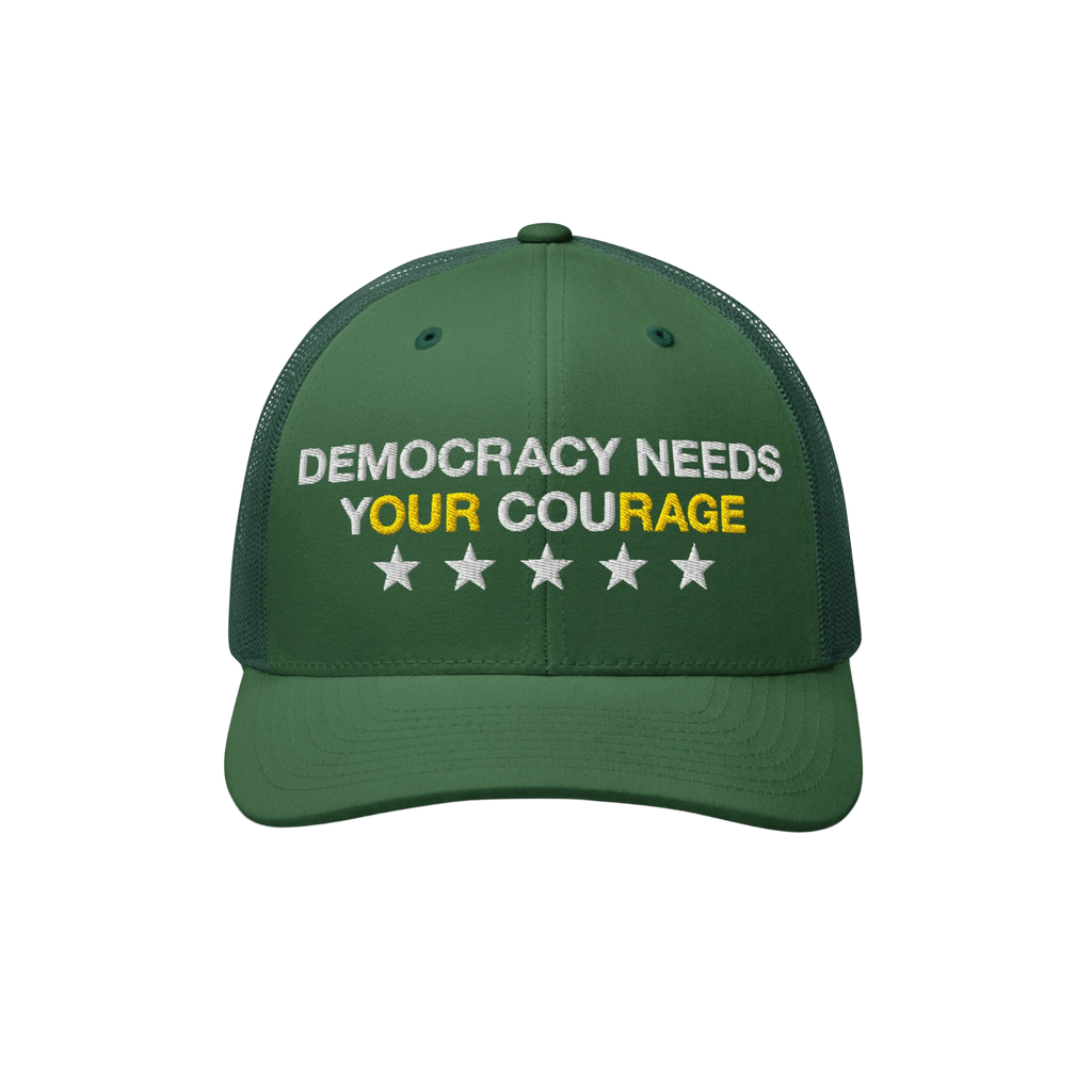 Democracy Hat: Green trucker-style cap with mesh back, featuring DEMOCRACY NEEDS YOUR COURAGE and five stars embroidered on t