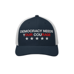 Democracy Hat featuring DEMOCRACY NEEDS YOUR COURAGE slogan with red-highlighted words, embroidered on navy-blue and white me