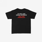Don't Be Complicit Baby Tee with bold message on back: IF YOU ARE DOING NOTHING in white, YOU ARE COMPLICIT in red. Designed for activism with a retro fit, perfect for standing up for justice.