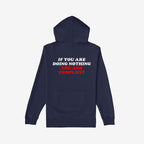 Navy-blue Don't Be Complicit Hoodie featuring a bold slogan on the back. The message, emphasizing action against complicity, is printed in white and red block letters, suitable for activism and everyday wear.
