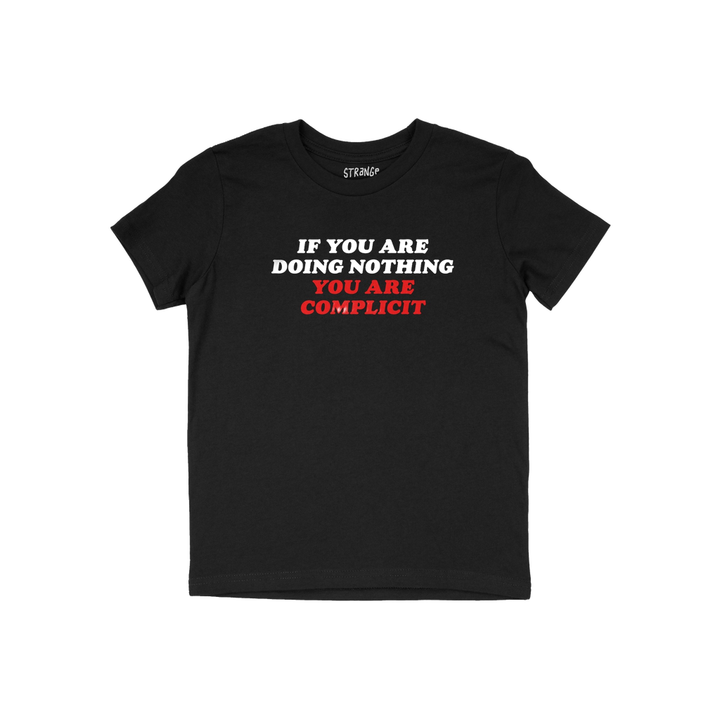 Don't Be Complicit T-shirt featuring bold, white and red slogan against injustice. The short-sleeve, black tee embodies activ