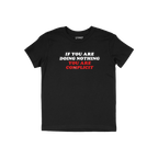 Don't Be Complicit T-shirt featuring bold, white and red slogan against injustice. The short-sleeve, black tee embodies activ