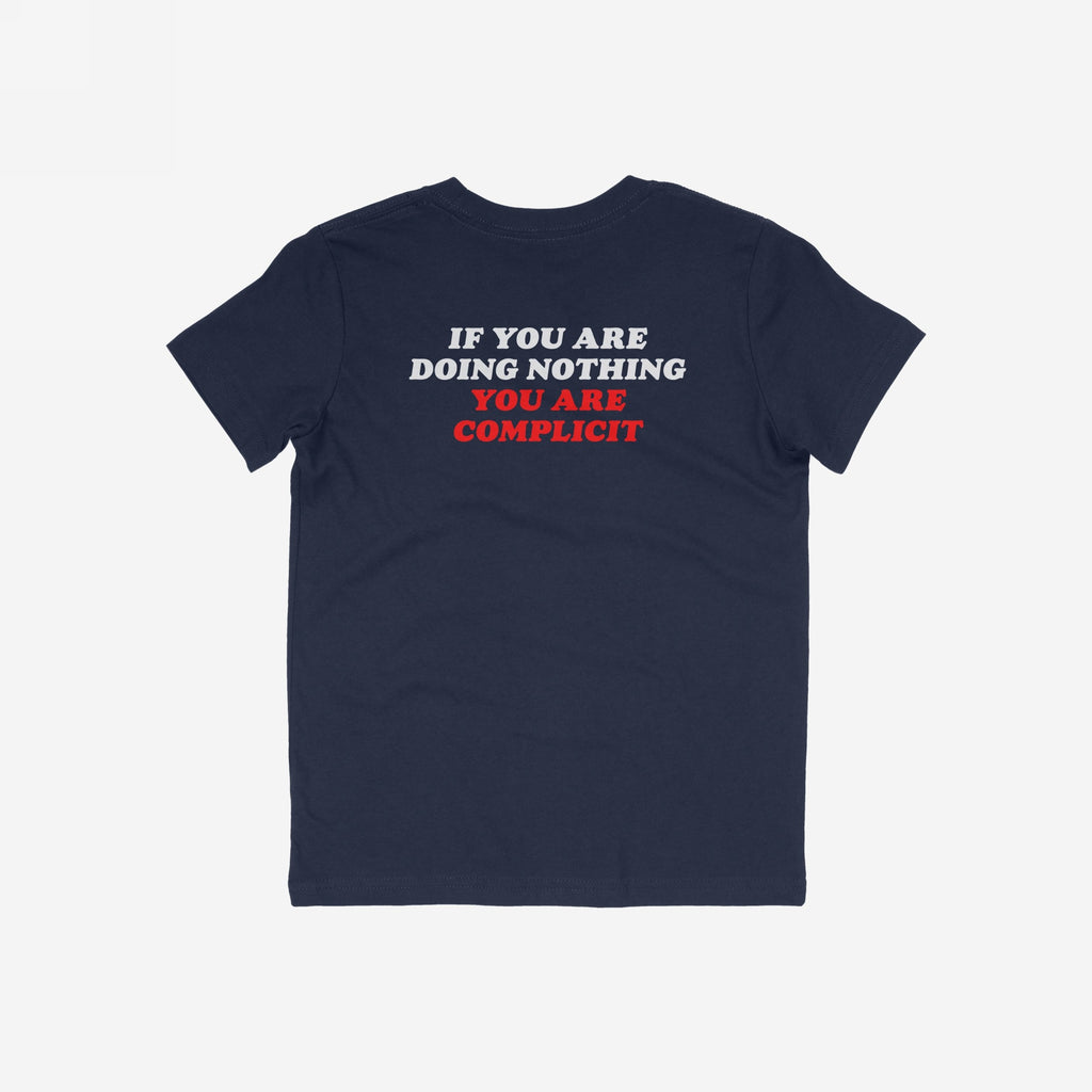 Don't Be Complicit T-shirt displaying bold protest message on the back, ideal for activism. Features white and red text emphasizing anti-fascism and equality, available in navy blue, slightly slim fit.