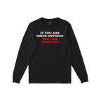 Don't Be Complicit T-shirt featuring a bold protest slogan in block letters, advocating against injustice. The black, long-sl