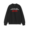 Don't Be Complicit Hoodie & Sweatshirt featuring bold slogan 'IF YOU ARE DOING NOTHING YOU ARE COMPLICIT' on black crew-neck,