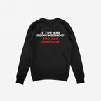 The Don't Be Complicit Hoodie & Sweatshirt features a bold back slogan, urging action against injustice, with a regular fit, ideal for expressing values through everyday wear.