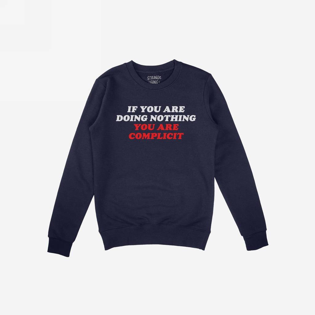 Don't Be Complicit sweatshirt in navy blue with bold slogan, ribbed cuffs, and hem. Perfect for showcasing your values in everyday life or protests. Features IF YOU ARE DOING NOTHING, YOU ARE COMPLICIT.