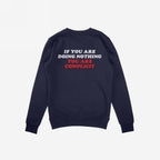 Back view of the Don't Be Complicit Sweatshirt showing the slogan IF YOU ARE DOING NOTHING YOU ARE COMPLICIT in bold block letters, embodying activism and commitment to social justice.