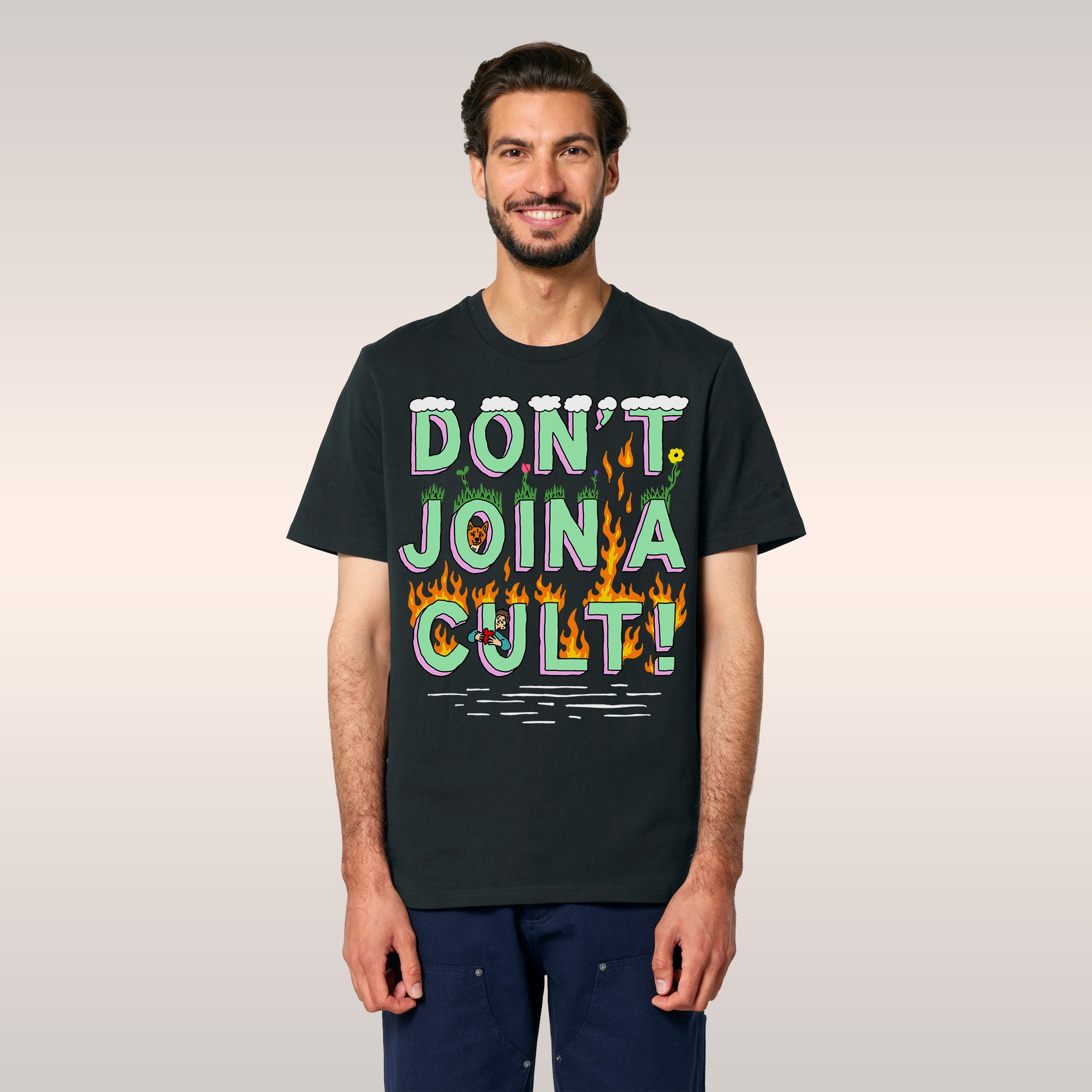 A person models the Don't Join A Cult Shirt, featuring a bold, illustrated slogan with whimsical details, perfect for progres
