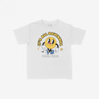 Downhill Women's Baby Tee featuring a retro smiley-face character striding with the phrase It's All Downhill From Here, highlighting a playful take on existential dread. Includes Strange Allies logo near the foot.