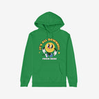 Green pullover hoodie featuring the Downhill Shirt design: a playful yellow smiley-face cartoon with IT’S ALL DOWNHILL and FROM HERE slogans, embodying comfortable cynicism and supporting NAMI.