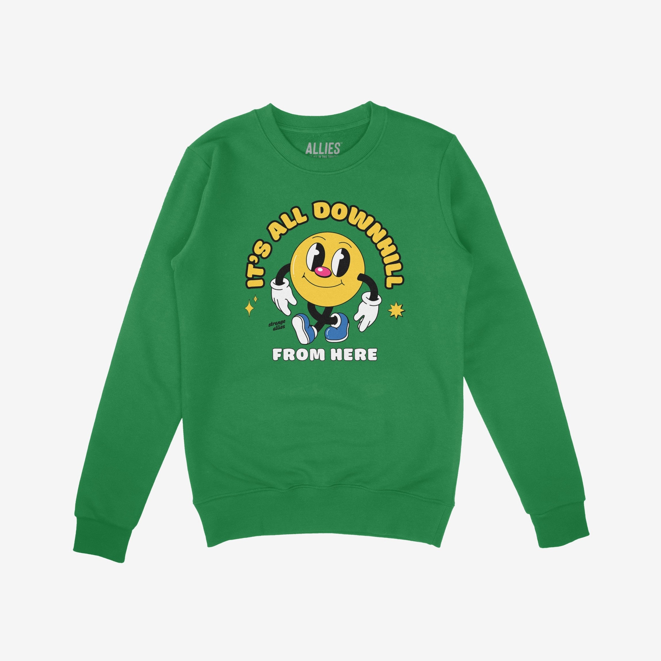 The Downhill Shirt features a cartoon smiley-face with sneakers and gloves, surrounded by “IT’S ALL DOWNHILL FROM HERE,” capturing a playful, sarcastic vibe. Supports NAMI, embracing life’s challenges humorously.