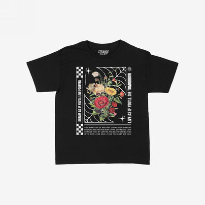 The Dreams Women's Baby Tee features a floral spider-web design with motivational slogans and checkerboard accents, embodying bold expression and existential reflection. Ideal for questioning life choices and embracing possibilities.