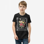 Young boy in a Dreams T-shirt featuring a vibrant floral graphic with checkerboard stripes and motivational text, embodying hope and urgency. The tee reflects an inspiring, dream-driven lifestyle.