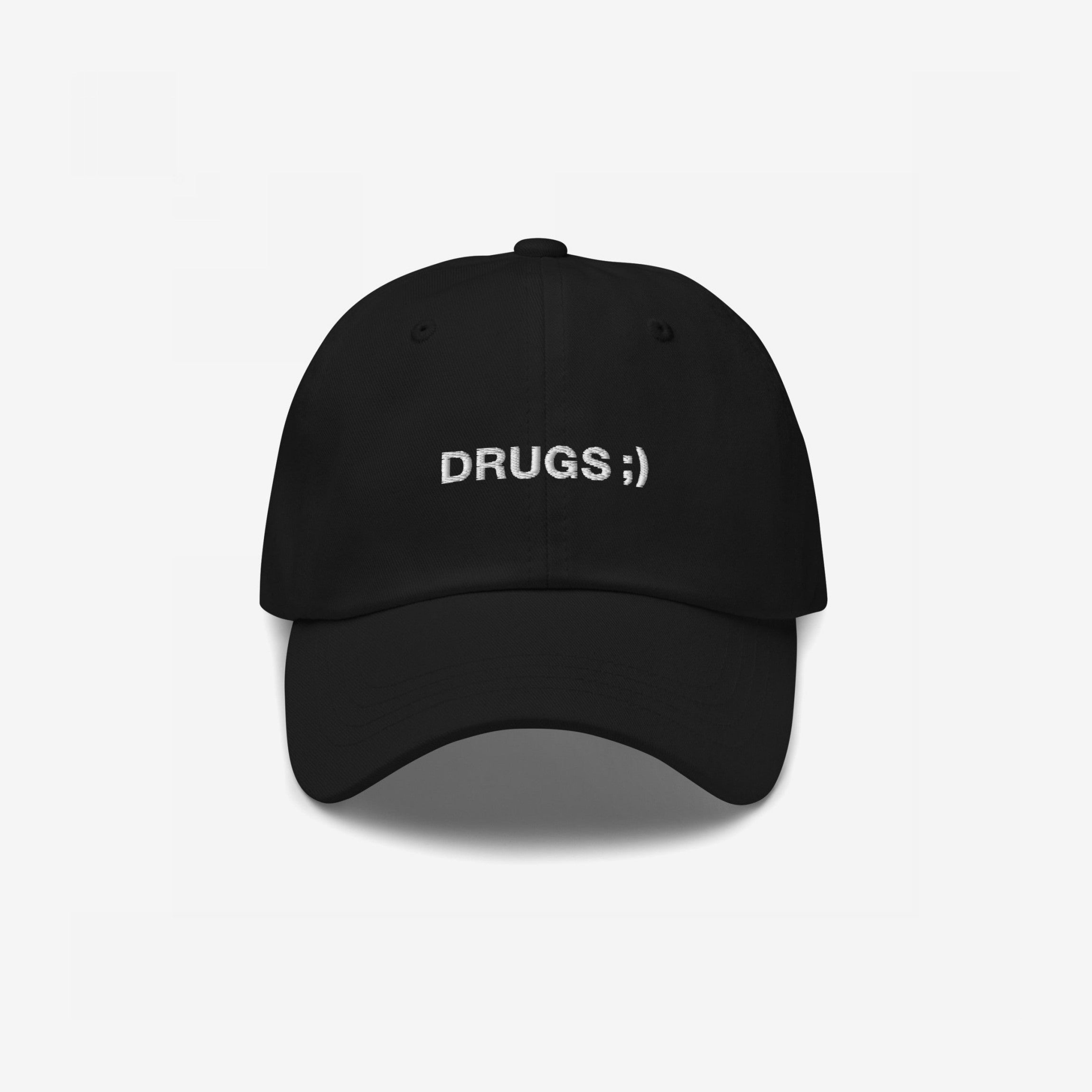 Black Drugs Hat with “DRUGS ;)” embroidered on the front, making a bold, ironic statement. A stylish accessory that adds edge and sparks conversation, aligning with the store's advocacy for equality and individuality.