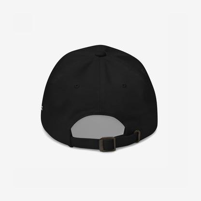 Black baseball cap featuring the Drugs Hat design, showcasing a back view with adjustable strap, metal buckle, and ventilation eyelets, embodying a bold, minimalist statement with versatile style.