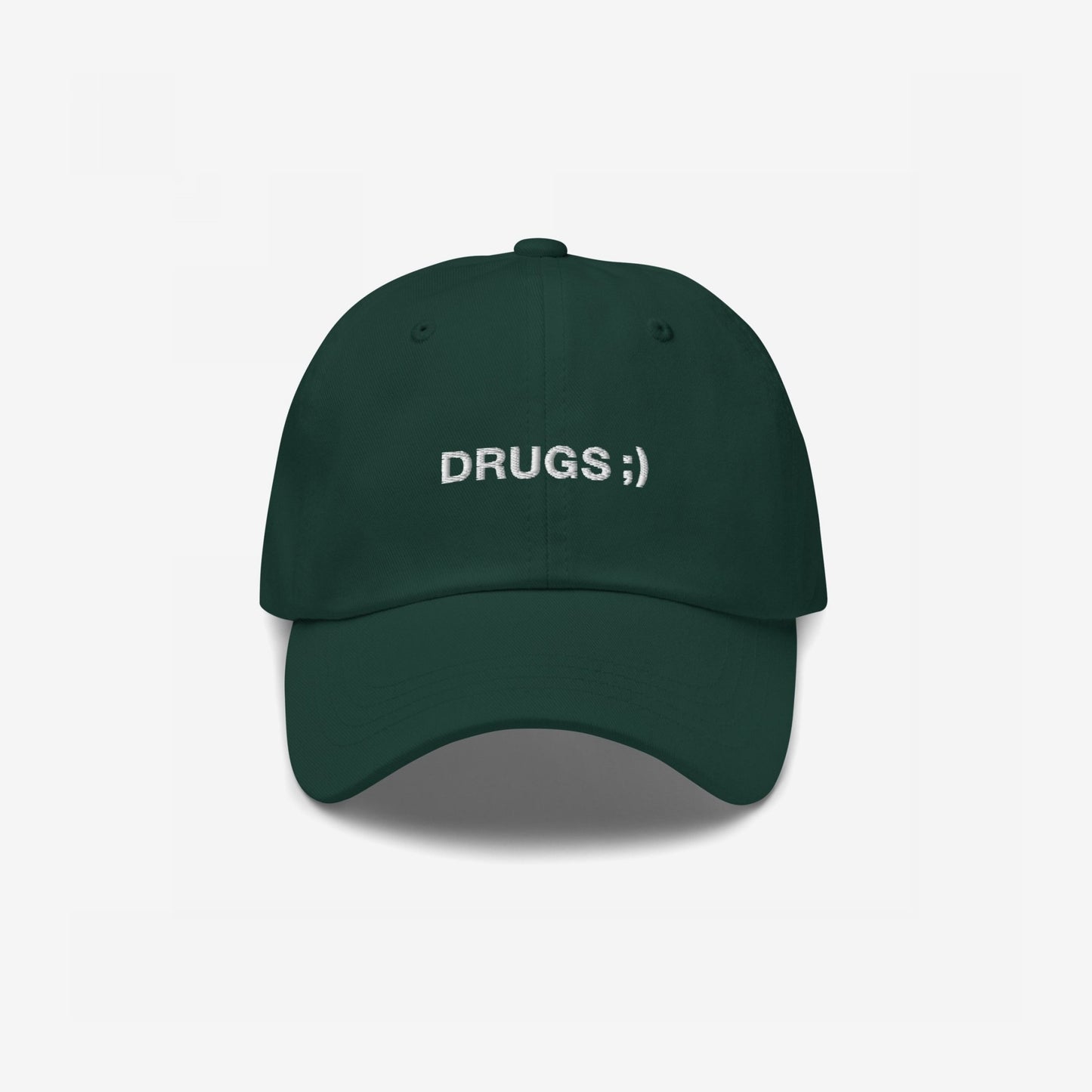 Dark green DRUGS ;) dad hat with white embroidery, embodying bold irony and minimalist flair. Ideal for casual or edgy looks, adding a conversational touch to any outfit.