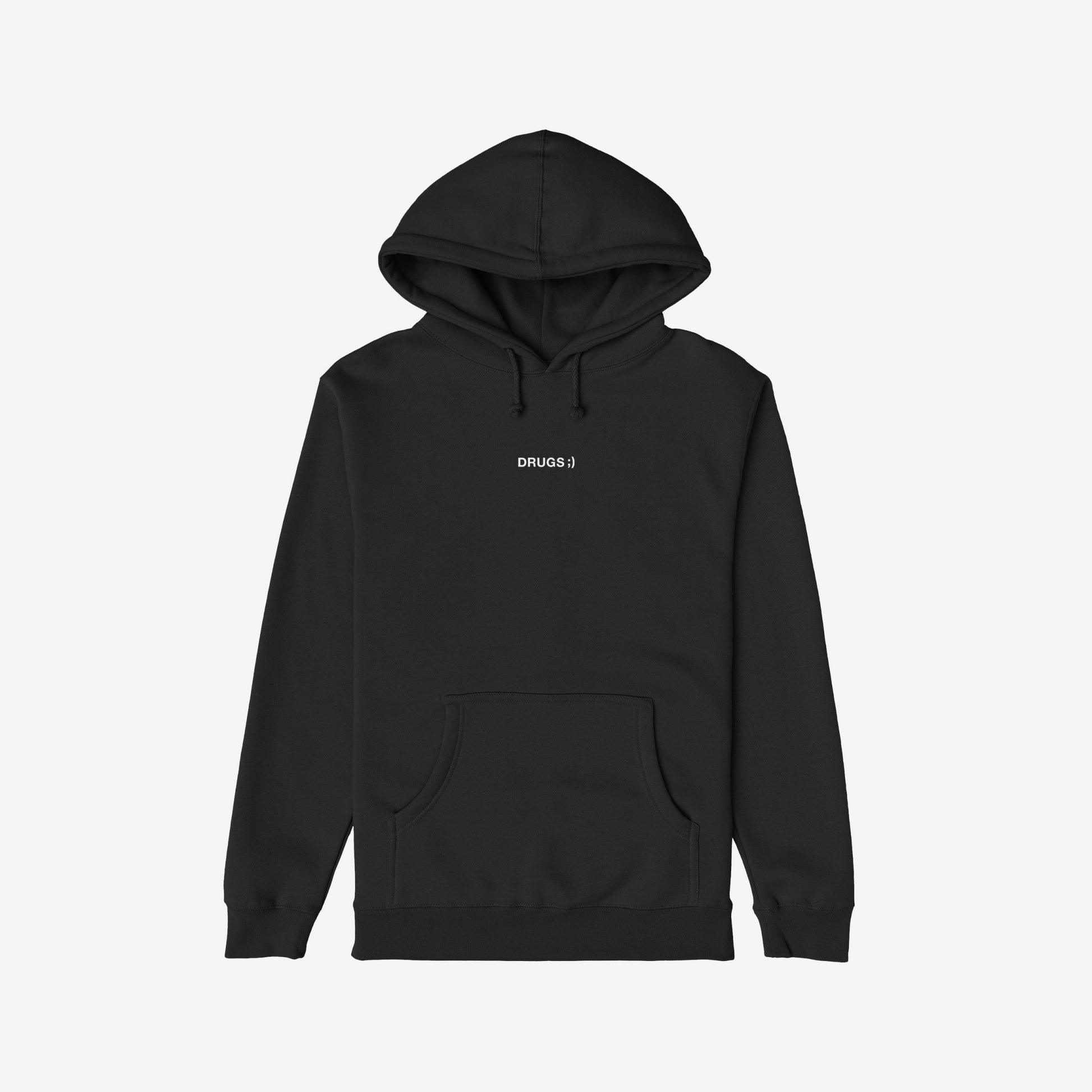 Drugs Hoodie & Sweatshirt: A black pullover hoodie with a drawstring hood and kangaroo pocket, featuring “DRUGS ;)” in white print on the chest, reflecting bold simplicity.