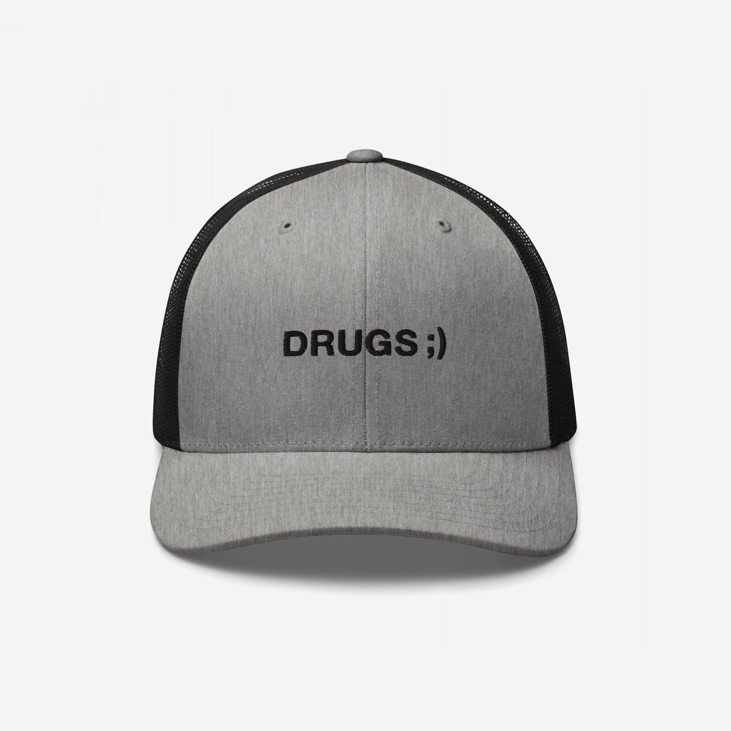 Gray-and-black trucker cap with DRUGS ;) embroidered on the front, making a bold, ironic statement. This hat adds edgy humor to any outfit, embodying a rebellious, conversation-starting style.