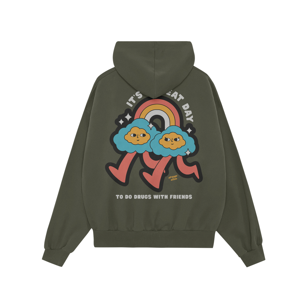 Green pullover “Drugs With Friends” hoodie features a white slogan on the chest. It has a kangaroo pocket and embodies re