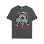 Drugs With Friends T-shirt features playful clouds under a rainbow with bold text, celebrating nonconformity and connection. 