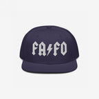 FAFO Hat featuring a dark navy snapback design with FA ⚡ FO in bold white gothic letters, embodying a hard rock-inspired style that signals resistance and defiance against fascism.