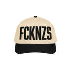 Two-tone FCKNZS Hat with beige crown and black brim, featuring bold black letters FCKN7S on the front, embodying a strong ant